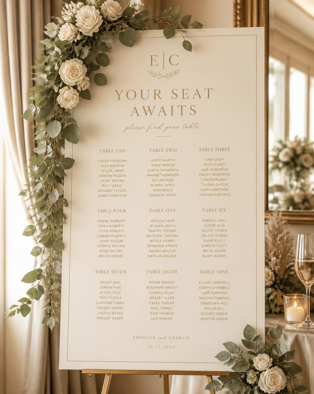 An elegant ivory seating chart framed with white roses